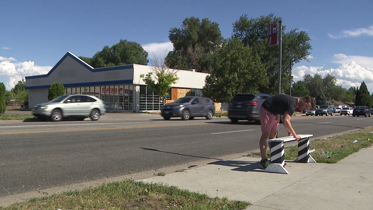 James Warren places a bench on Sheridan