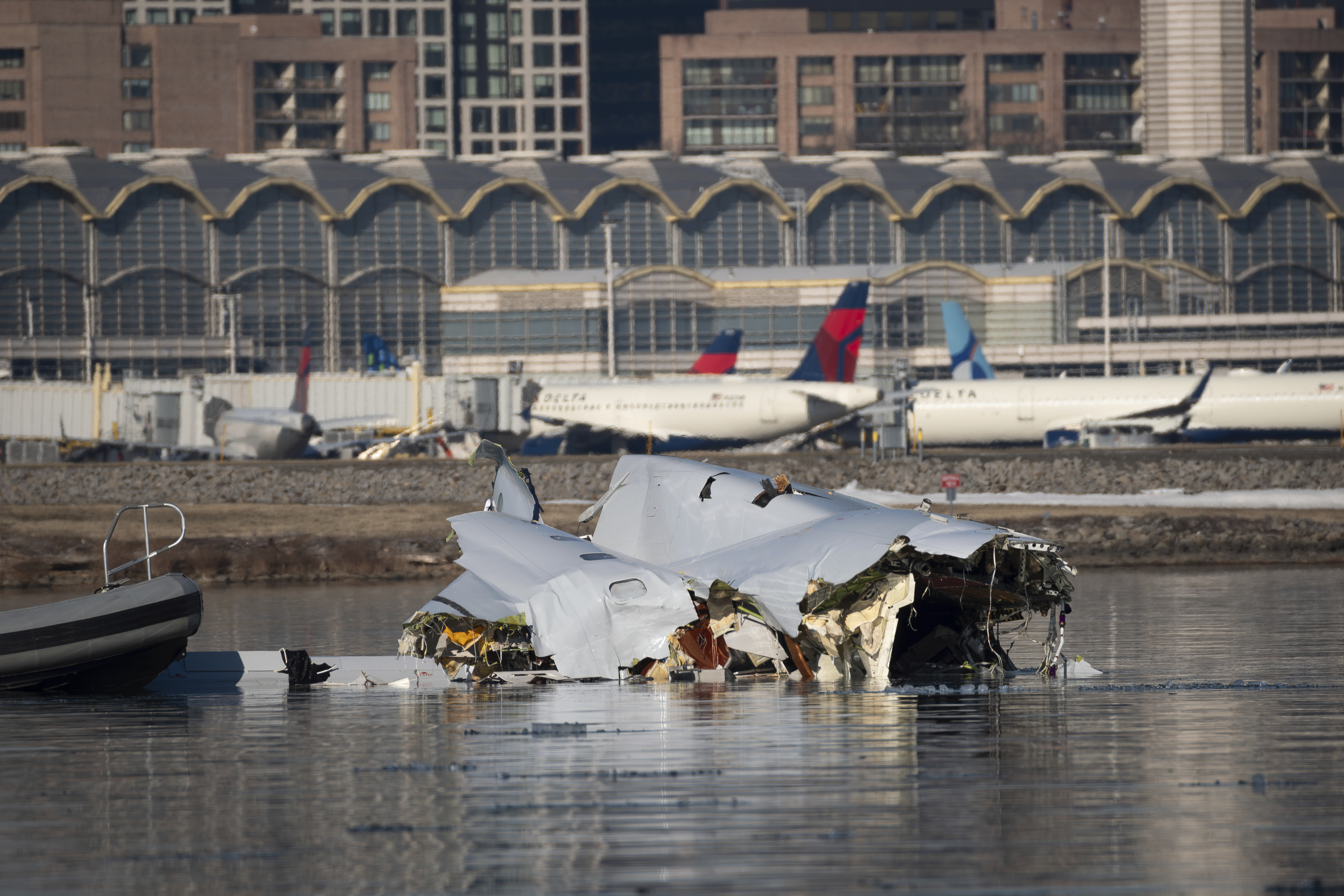 In this image provided by the U.S. Coast Guard, wreckage is seen in the Potomac River near Ronald Reagan Washington National Airport, Thursday, Jan. 30, 2025 in Washington. 
