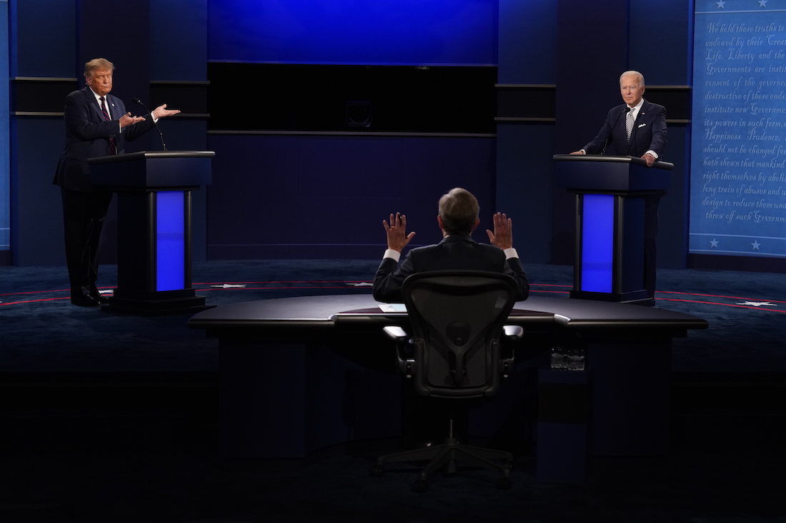Debate commission adopts new rules to mute mics