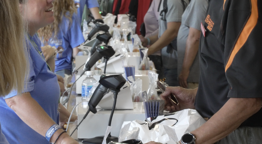 A checkout line at EAA, where visitors can purchase merchandise.