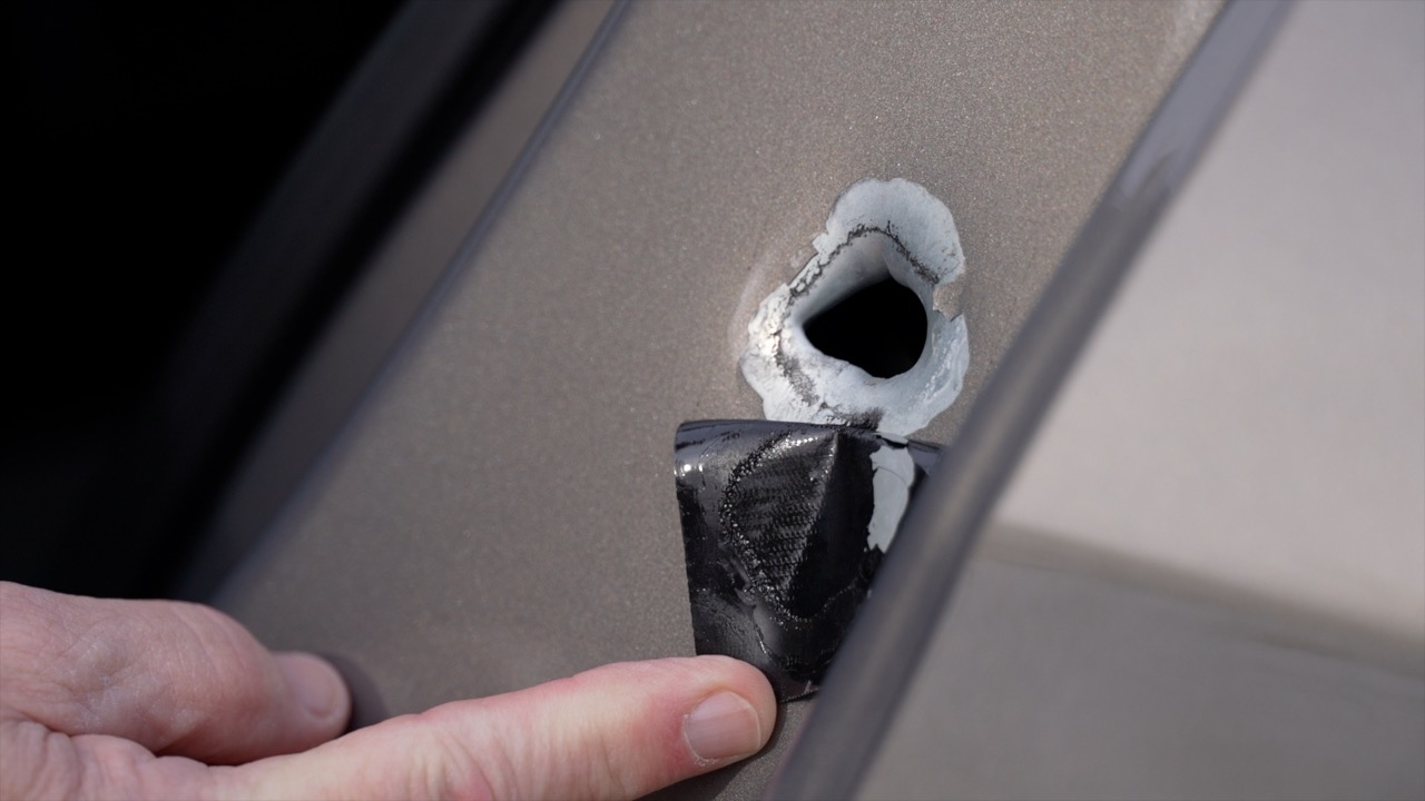 His car was shot at while driving for Lyft. Now, he could be out thousands of dollars. 