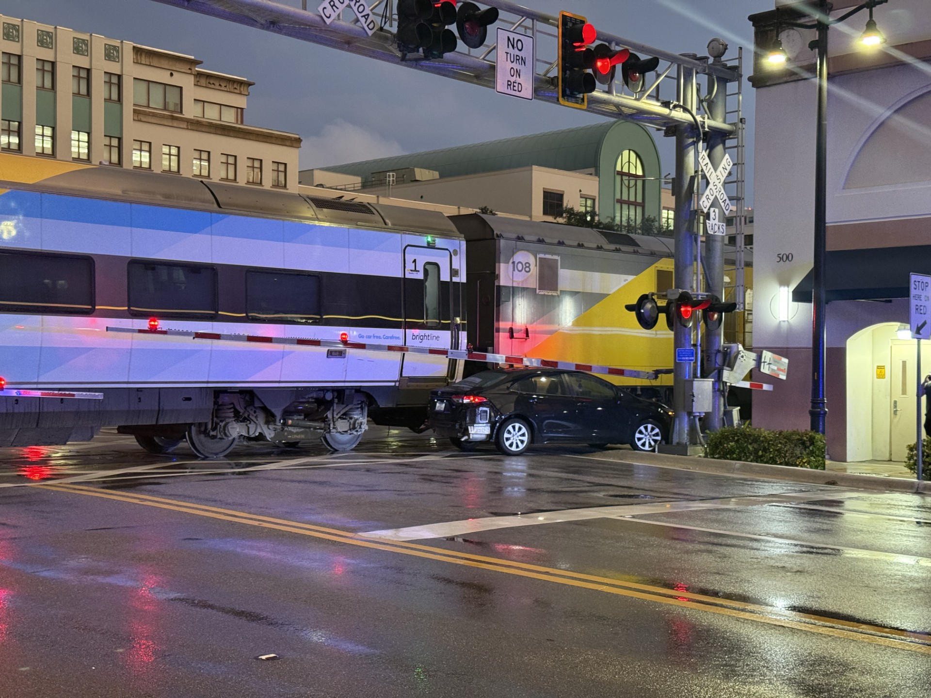 Brightline train crashes into car