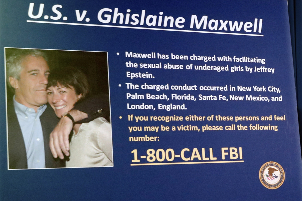 A board outlining the case against Ghislaine Maxwell is seen during a news conference to announce charges against Maxwell for her alleged role in the sexual exploitation and abuse of multiple minor girls by Jeffrey Epstein, July 2, 2020, in New York. 