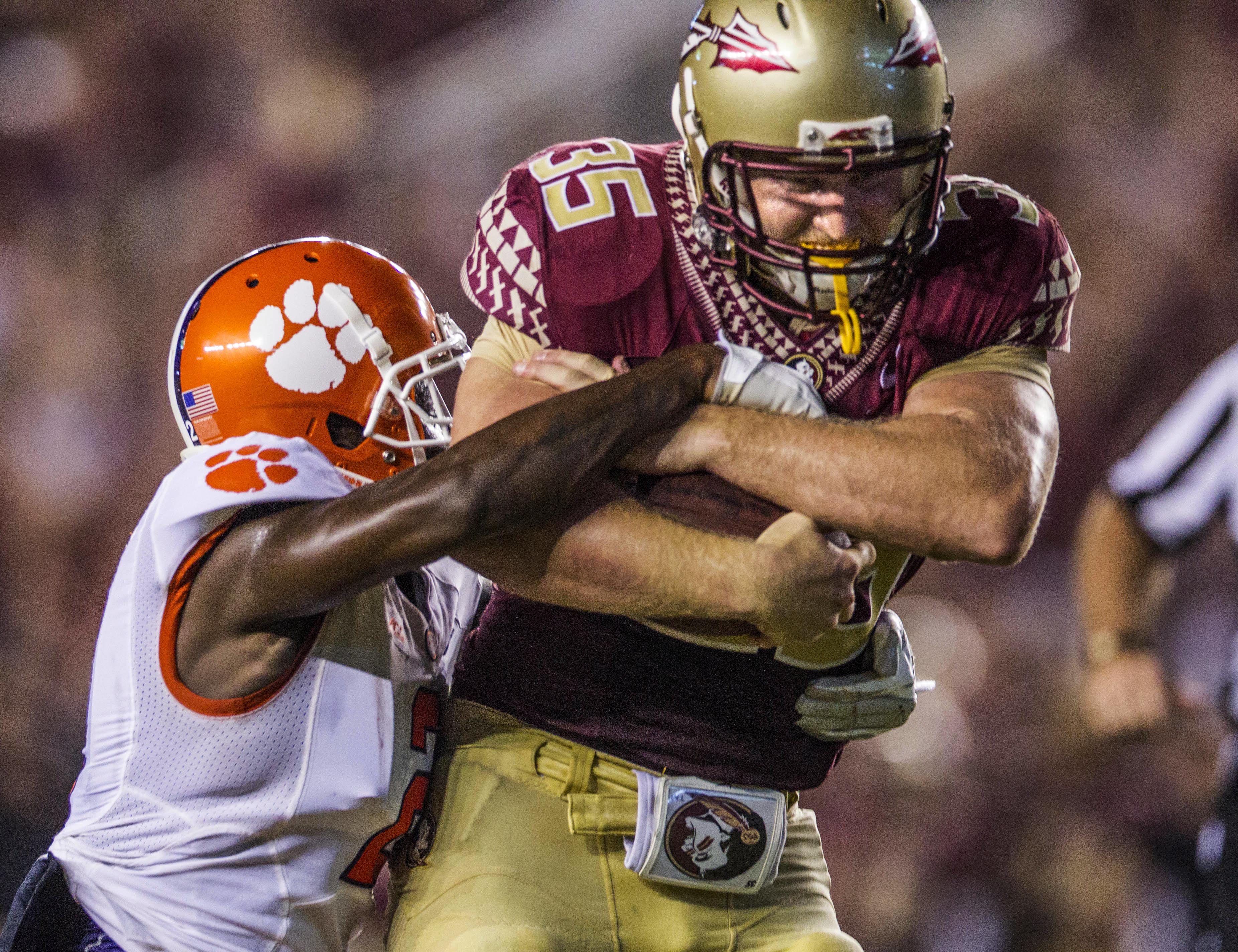 Florida State Seminoles tight end Nick O'Leary drags Clemson Tigers cornerback Mackensie Alexander to 1-yard line in 2014