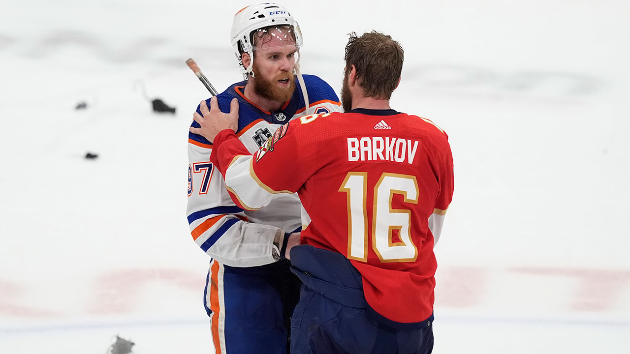 FILE - Florida Panthers center Aleksander Barkov (16) talks to Edmonton Oilers center Connor McDavid (97) at the end of Game 7 of the NHL hockey Stanley Cup Final, Monday, June 24, 2024, in Sunrise, Fla. (AP Photo/Rebecca Blackwell, File)