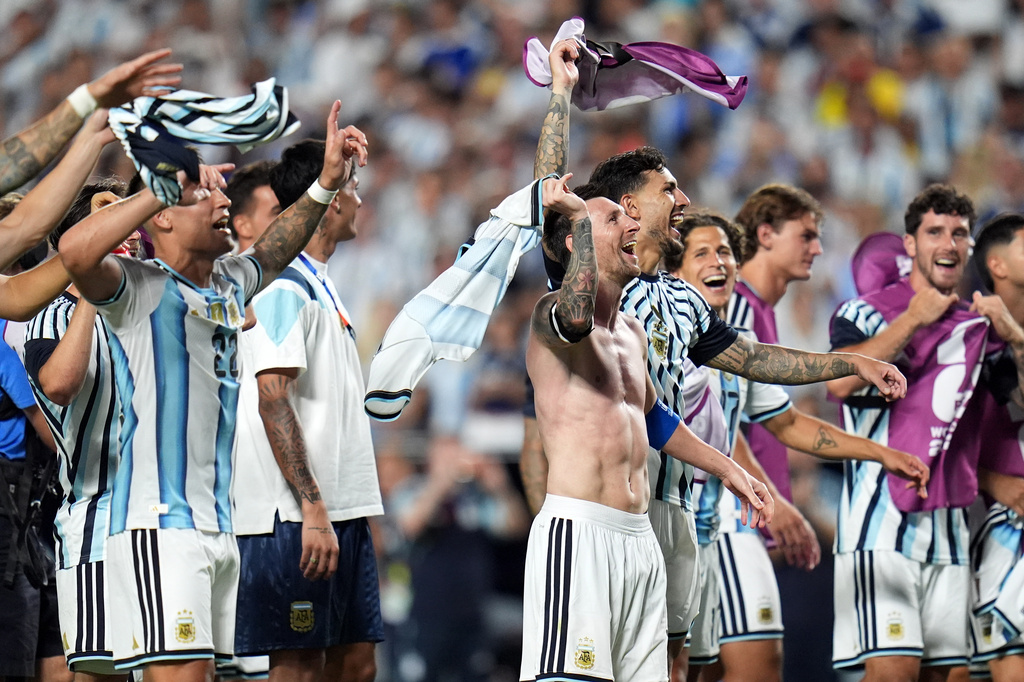 Argentina's Lionel Messi (10), center, and teammates celebrate after the World Cup quarterfinal soccer match between Argentina and Switzerland in Kansas City, Mo., Saturday, July 11, 2026. 