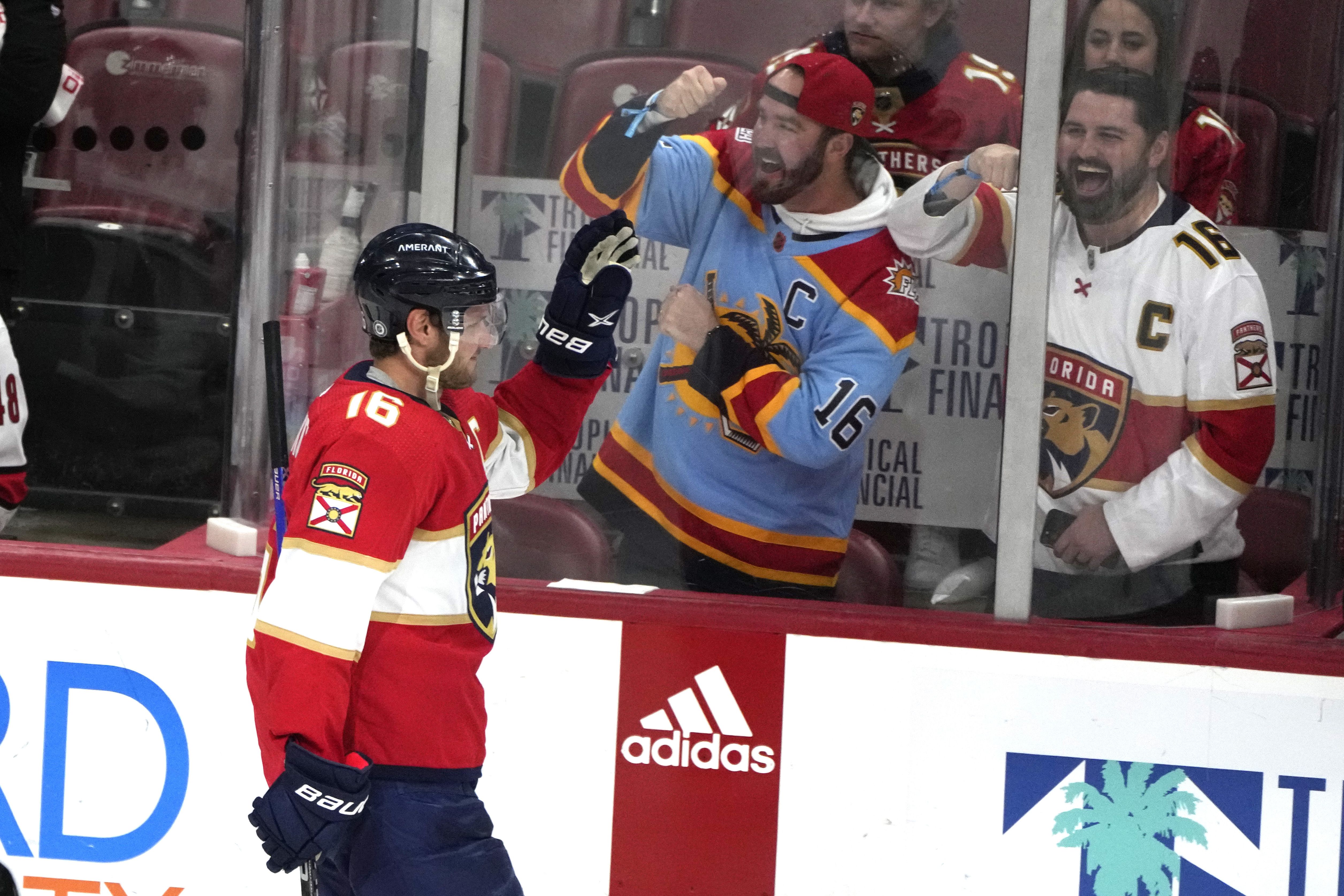 Florida Panthers fans celebrate after center Aleksander Barkov scores goal against Carolina Hurricanes, April 13, 2023
