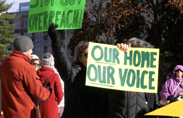 Our Home Our Voice signs