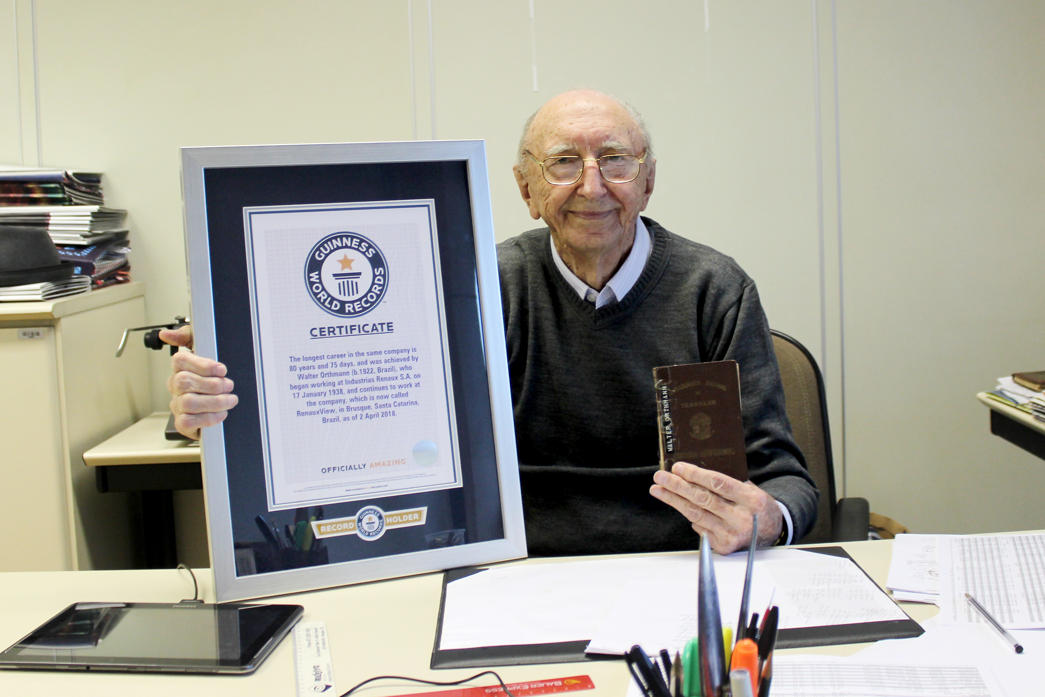 Walter Orthmann holding the GWR certificate