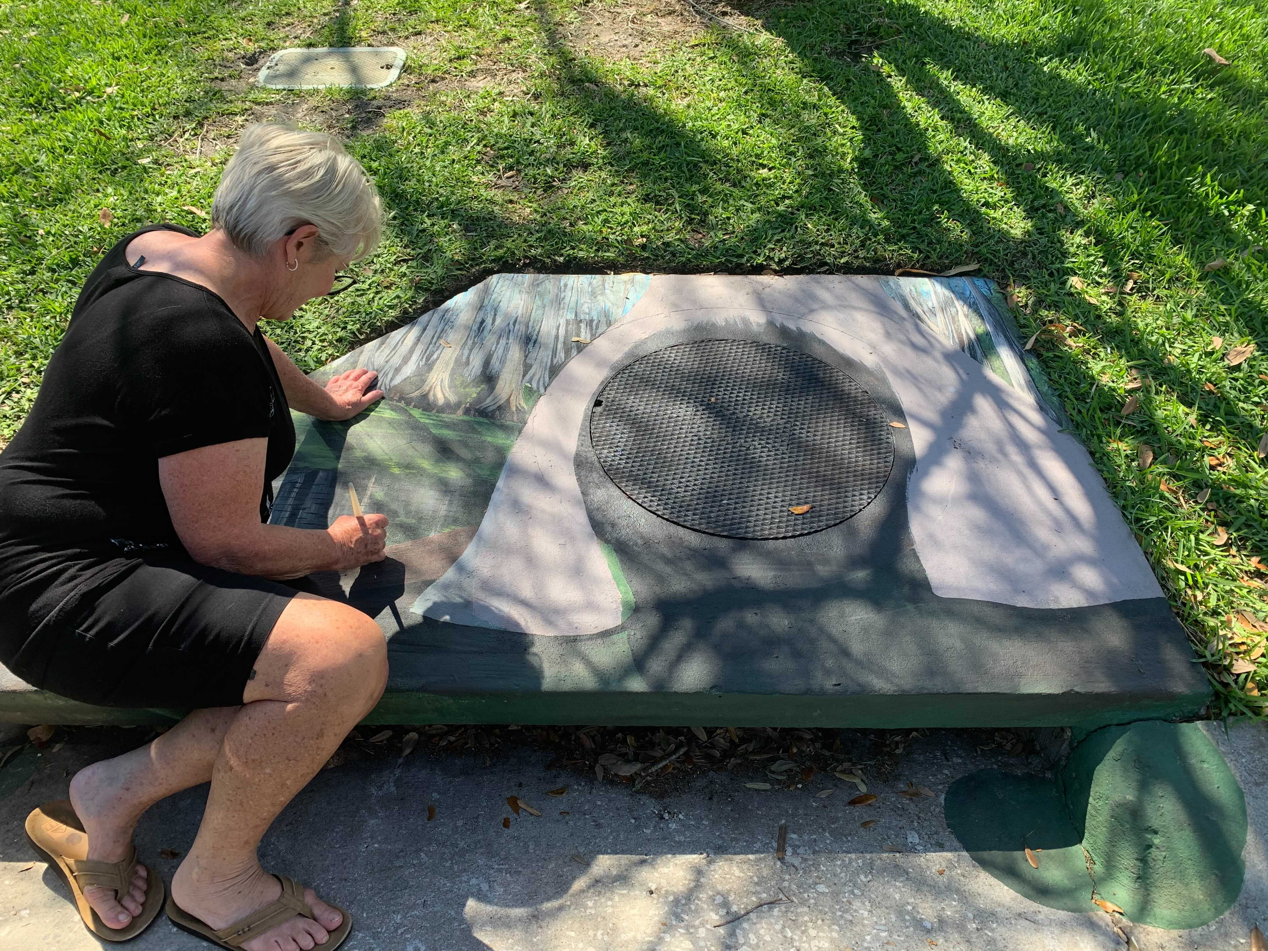 painting on storm drains
