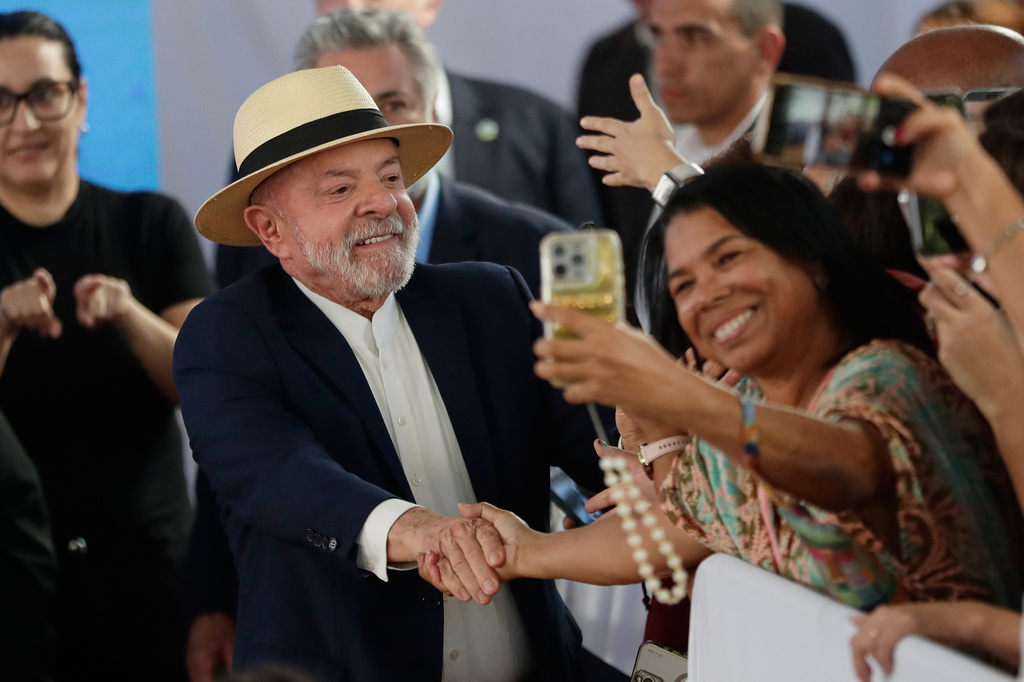 Brazil's President Luiz Inacio Lula da Silva greets supporters during a visit to a mobile women's health unit at the Escola Nacional de Saude Publica, in Rio de Janeiro, Friday, July 17, 2026. 
