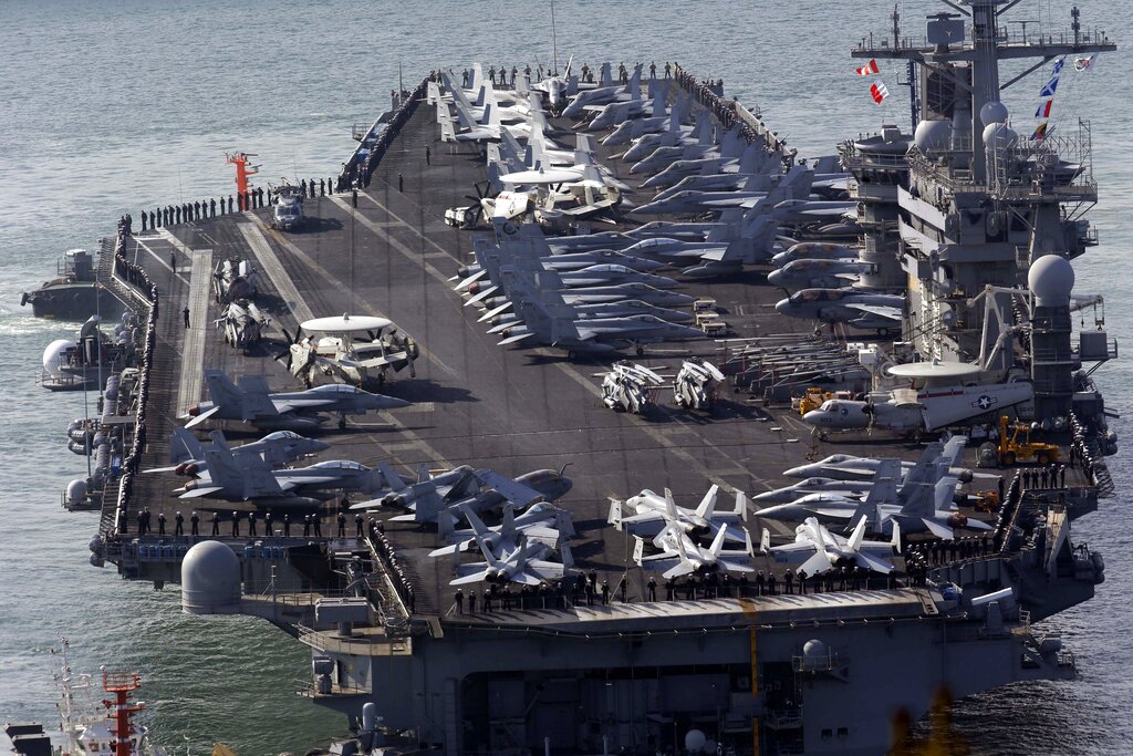 In this May 11, 2013, photo, U.S. nuclear-powered aircraft carrier USS Nimitz approaches Busan port, south of Seoul, South Korea.