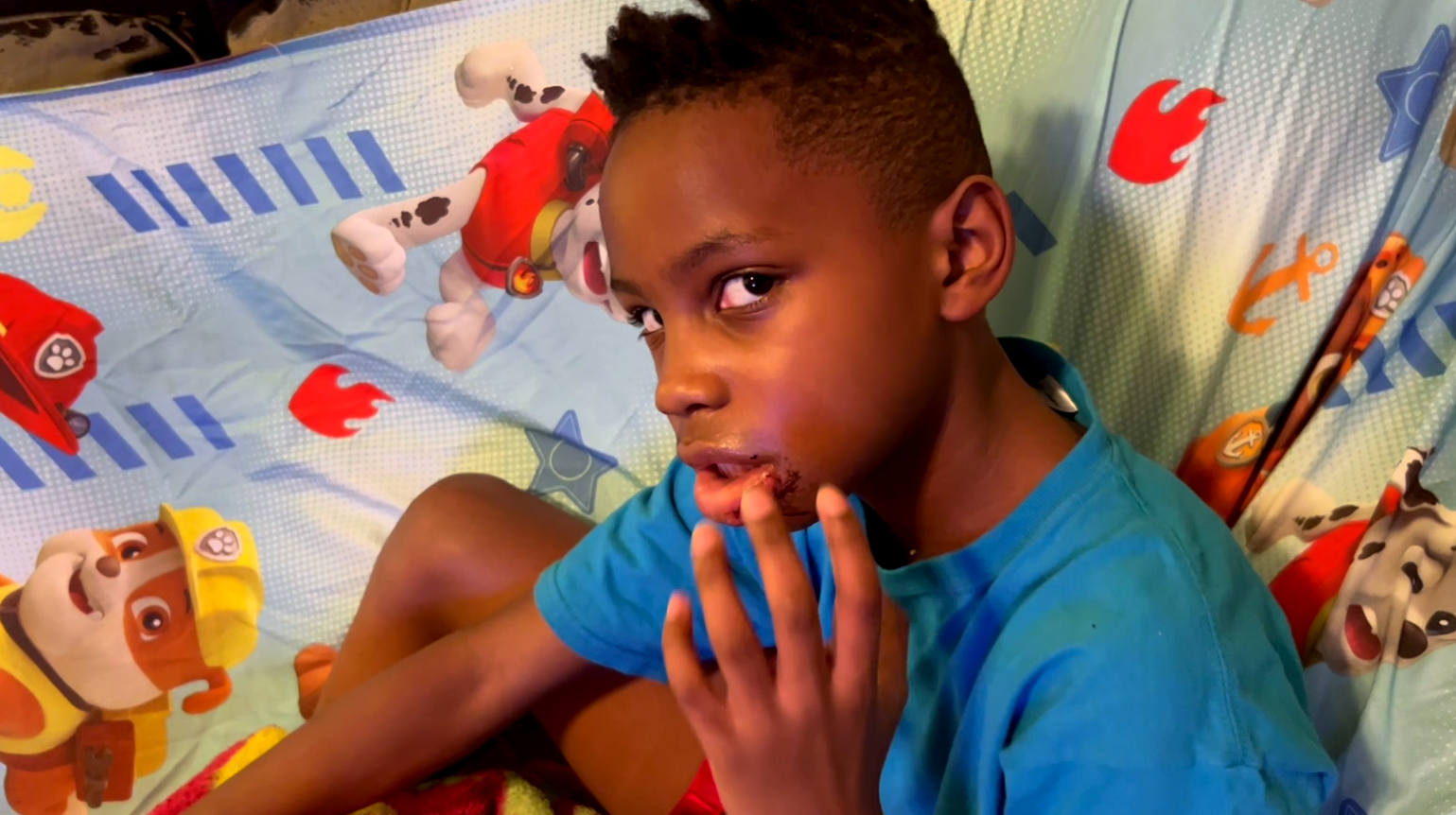 He ran into a Richmond apartment to escape gunfire. A dog attacked him.