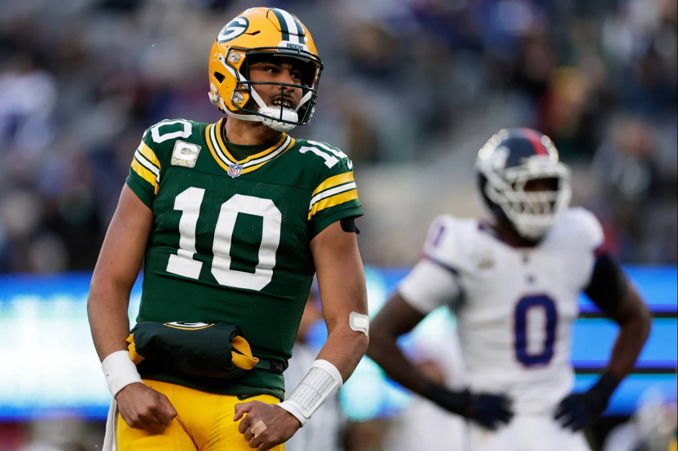Green Bay Packers' Jordan Love reacts to a touchdown pass during the second half of an NFL football game against the New York Giants Sunday, Nov. 16, 2025, in East Rutherford, N.J.