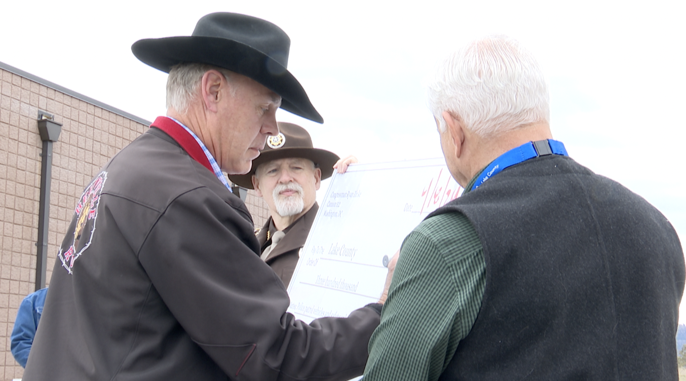 Zinke Flathead Check signing