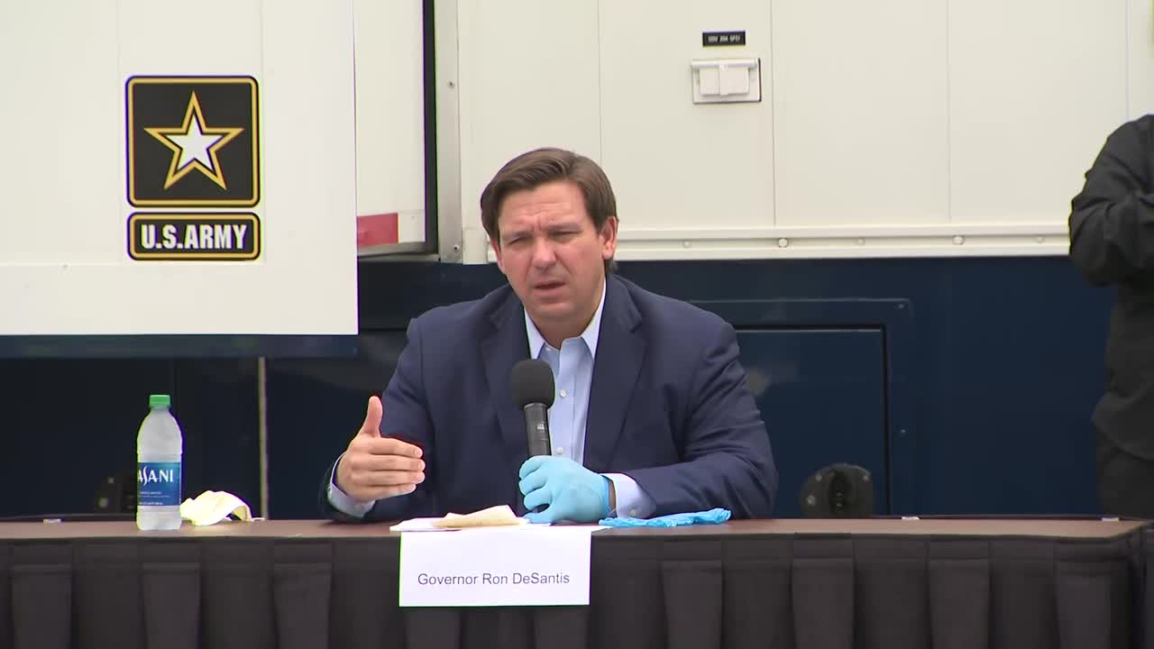 wptv-gov-desantis-coronavirus-miami-beach-4-8-20.jpg