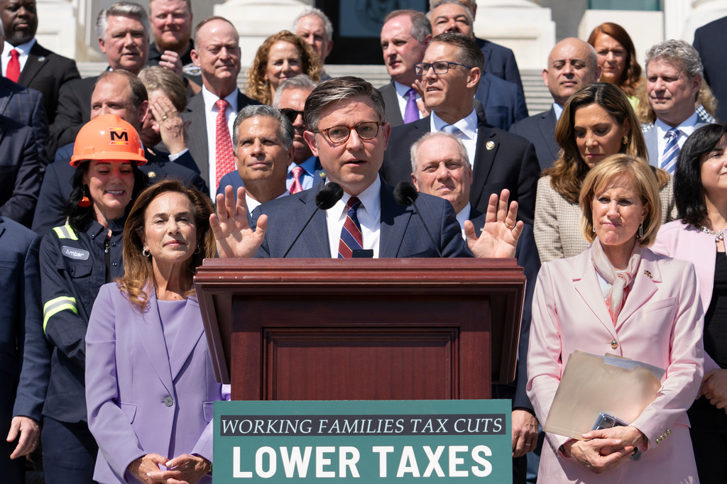 Speaker of the House Mike Johnson, R-La., and fellow Republicans celebrate GOP tax policies at an event outside the Capitol in Washington, Wednesday, April 15, 2026. 