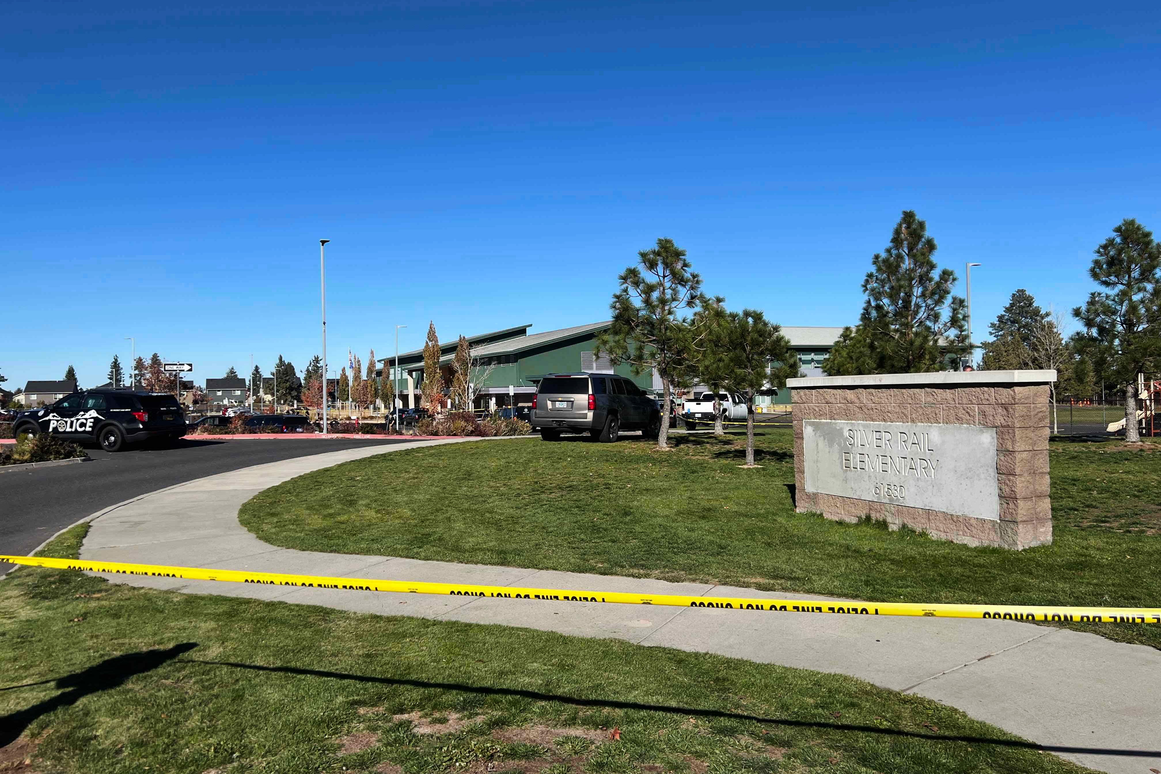 Police tape is placed outside Silver Rail Elementary school, where a shooting took place, on Thursday, Oct. 15, 2026 in Bend, Ore.