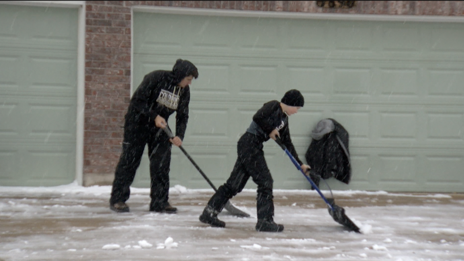 Brewster Brothers Shoveling Snow