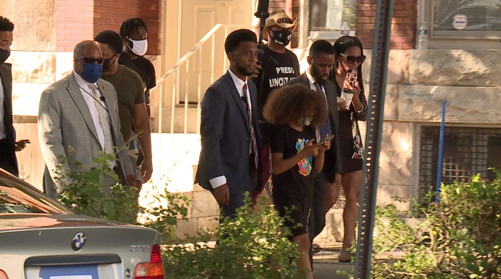 Mayor walks with residents in Mondawmin neighborhood during violent week