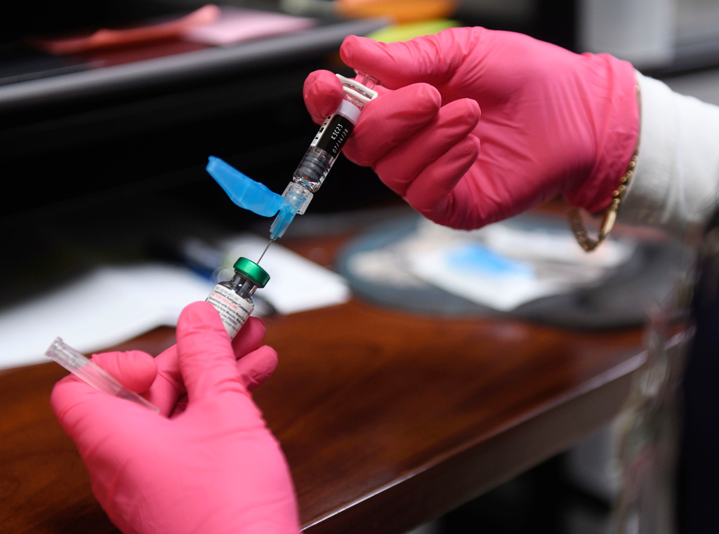 Anna Hicks prepares a measles, mumps and rubella vaccine at the Andrews County Health Department, Tuesday, April 8, 2025, in Andrews, Texas. 