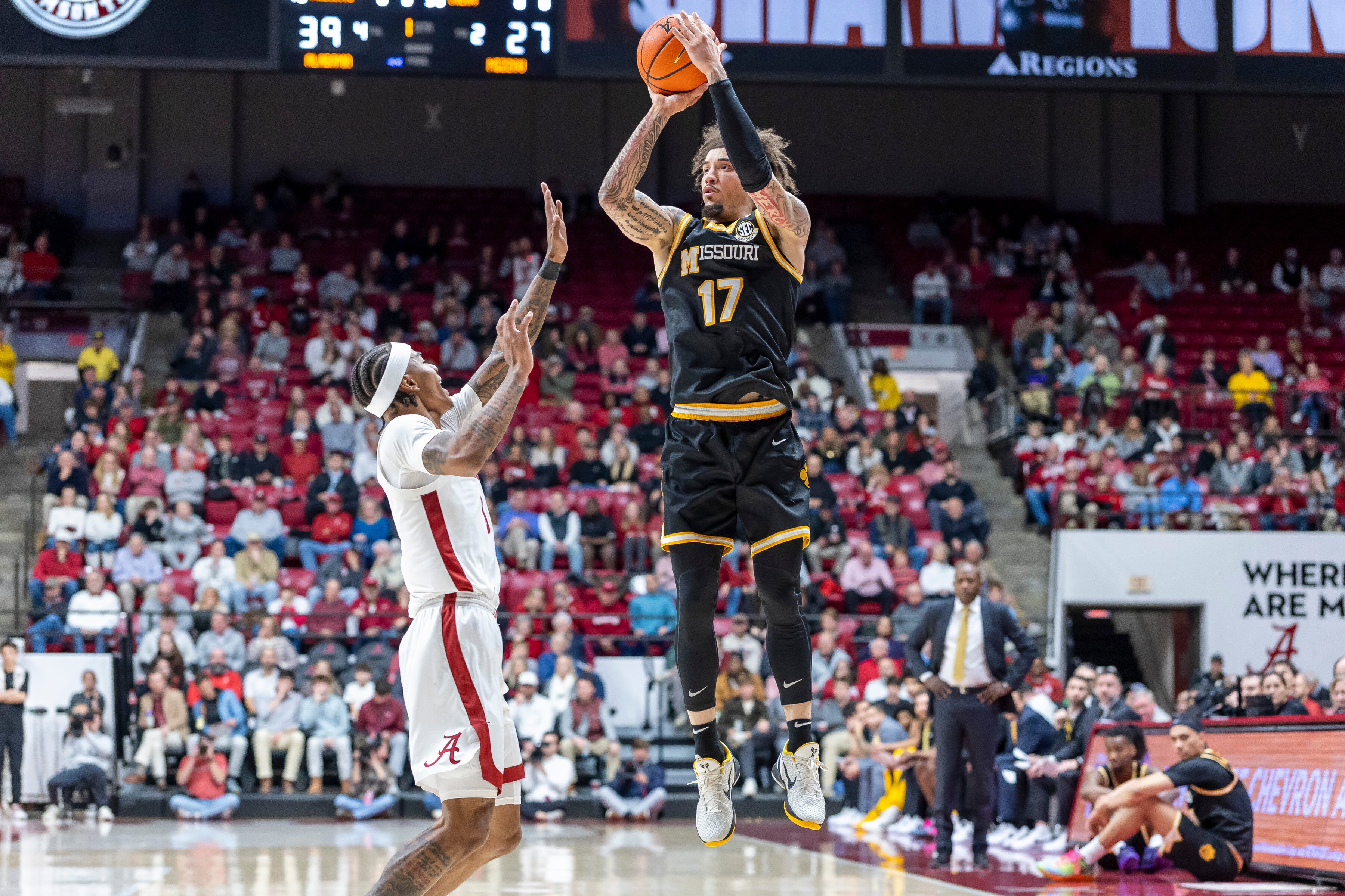 Missouri guard Jayden Stone (17), Alabama guard Labaron Philon Jr. (0)