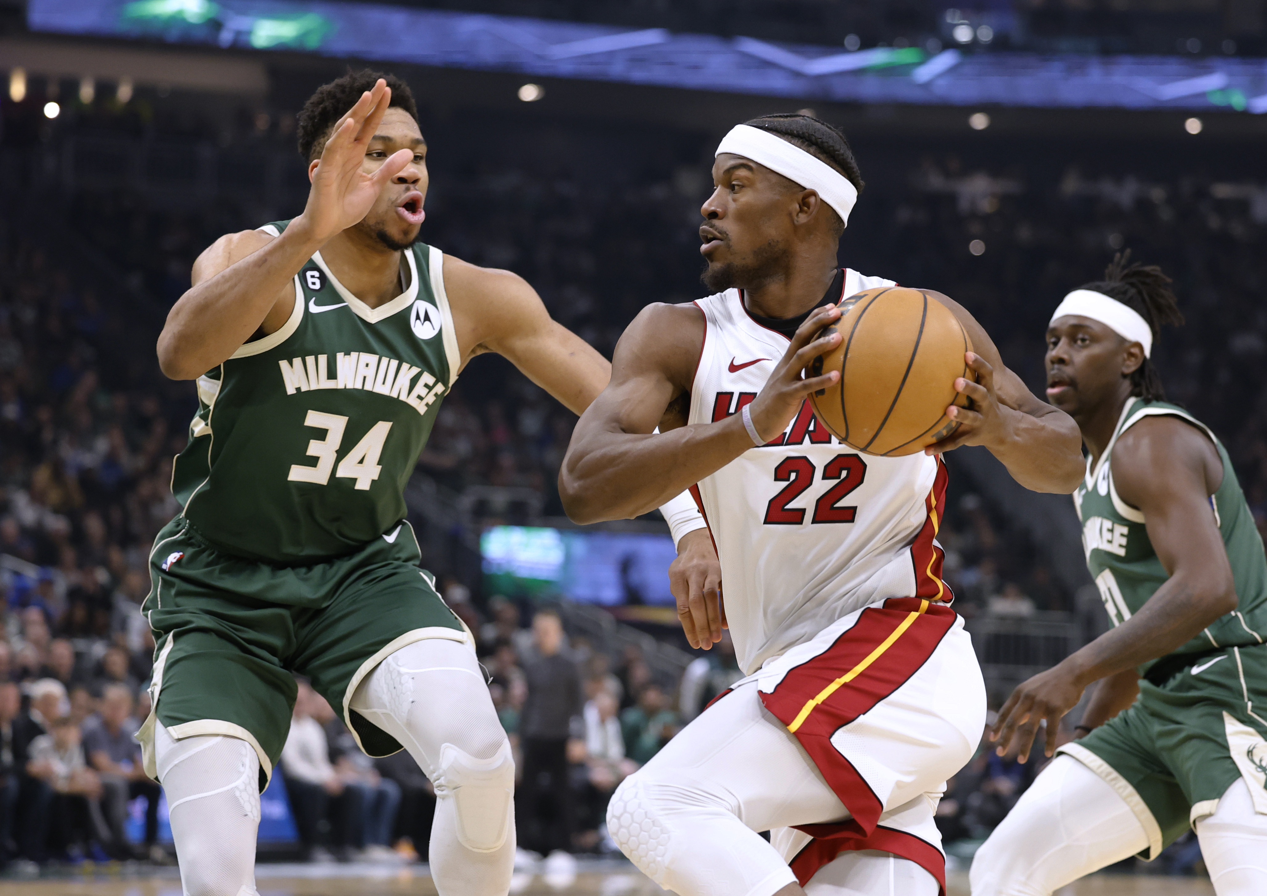 Miami Heat forward Jimmy Butler drives against Milwaukee Bucks forward Giannis Antetokounmpo in first half of Game 5 of NBA first-round playoff series, April 26, 2023