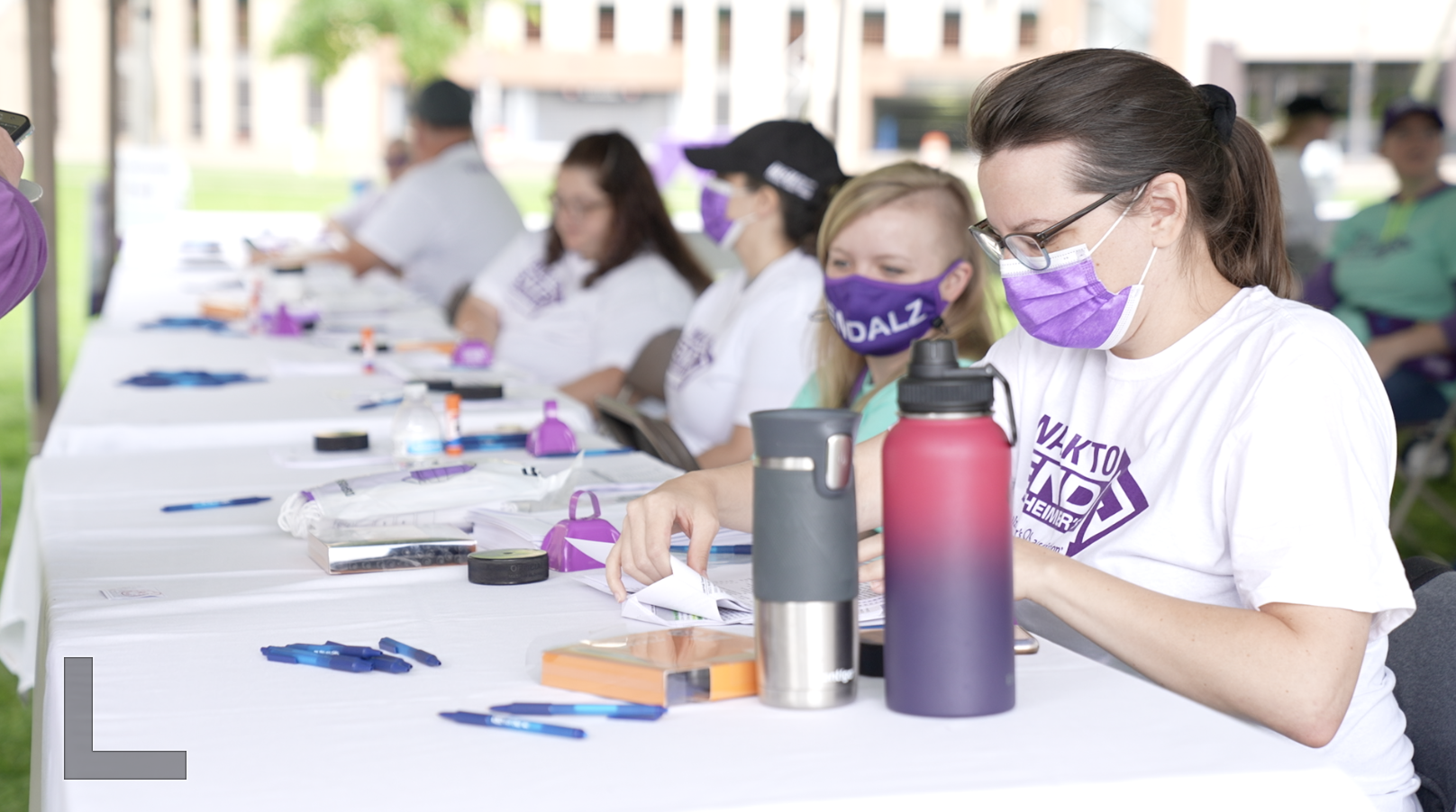 Volunteers help raise awareness and funds for Alzheimer's Disease.