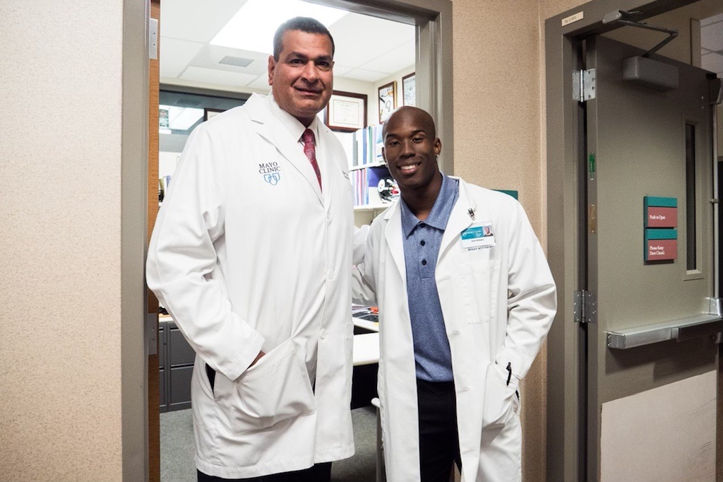 ASU player trading uniform for white coat