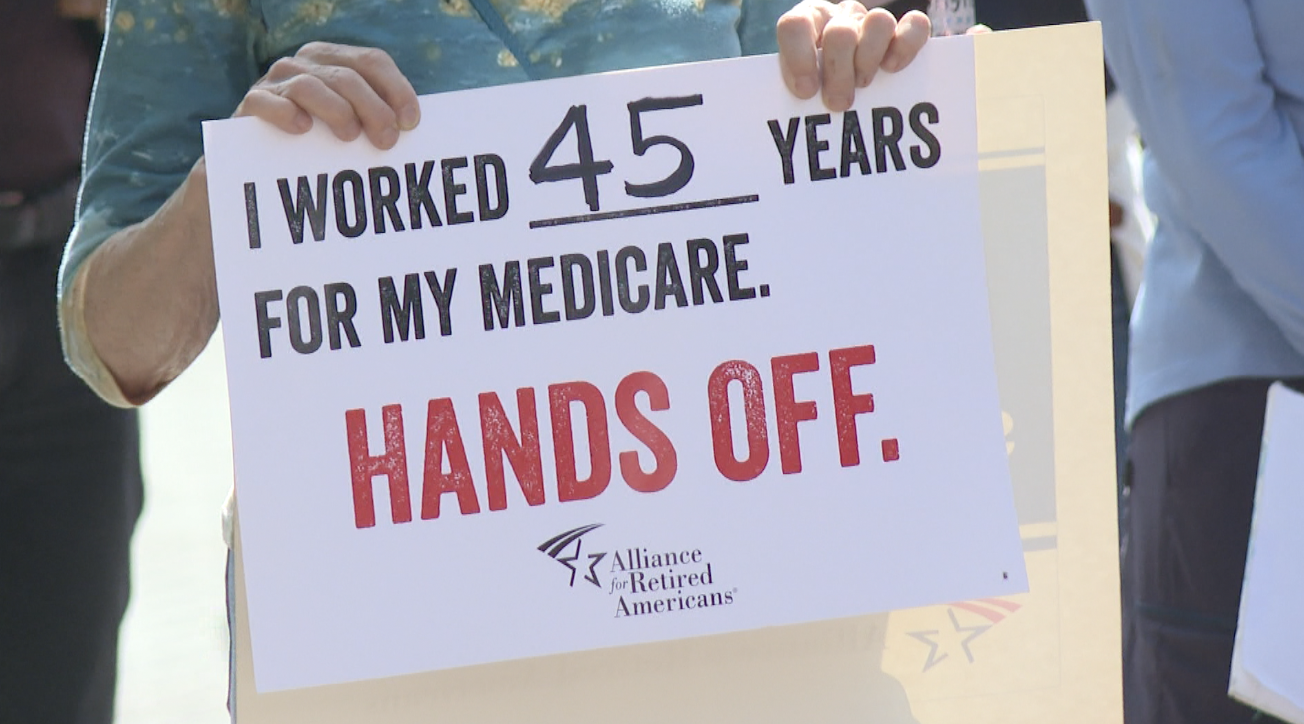 Neighbors rally calling on Congressman Neal Dunn for answers on the state of social security amid proposed federal cuts 
