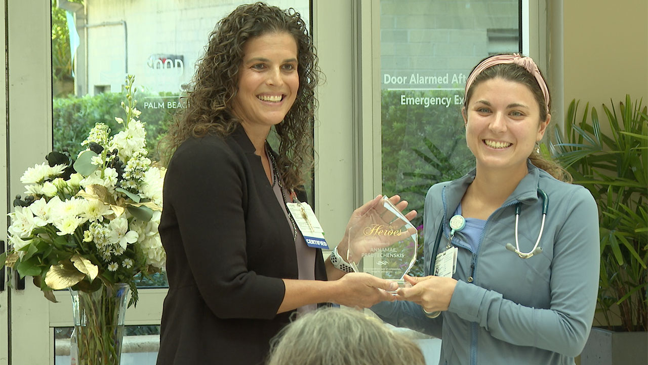 Registered nurse AnnaMae Predtechenskis (right) is honored at Good Samaritan Medical Center on June 27, 2024.