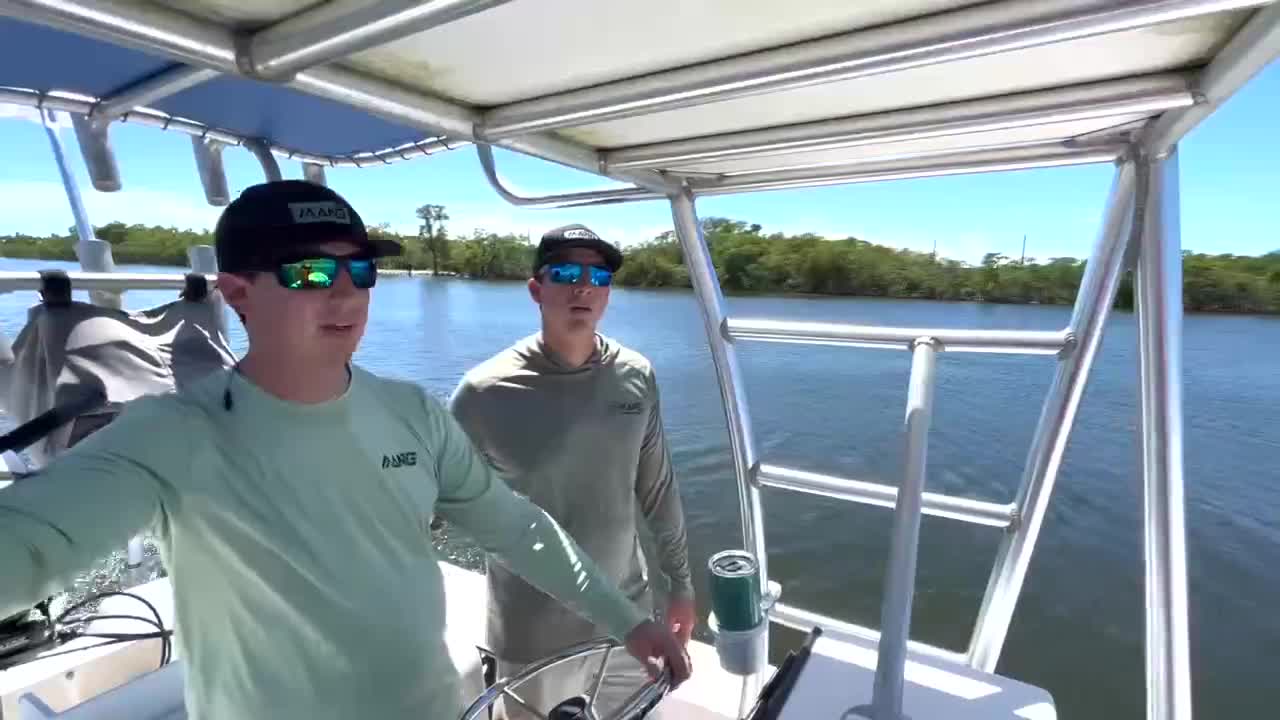 Rossin twins planting mangroves in Palm Beach County Oct 3 2023.jpg