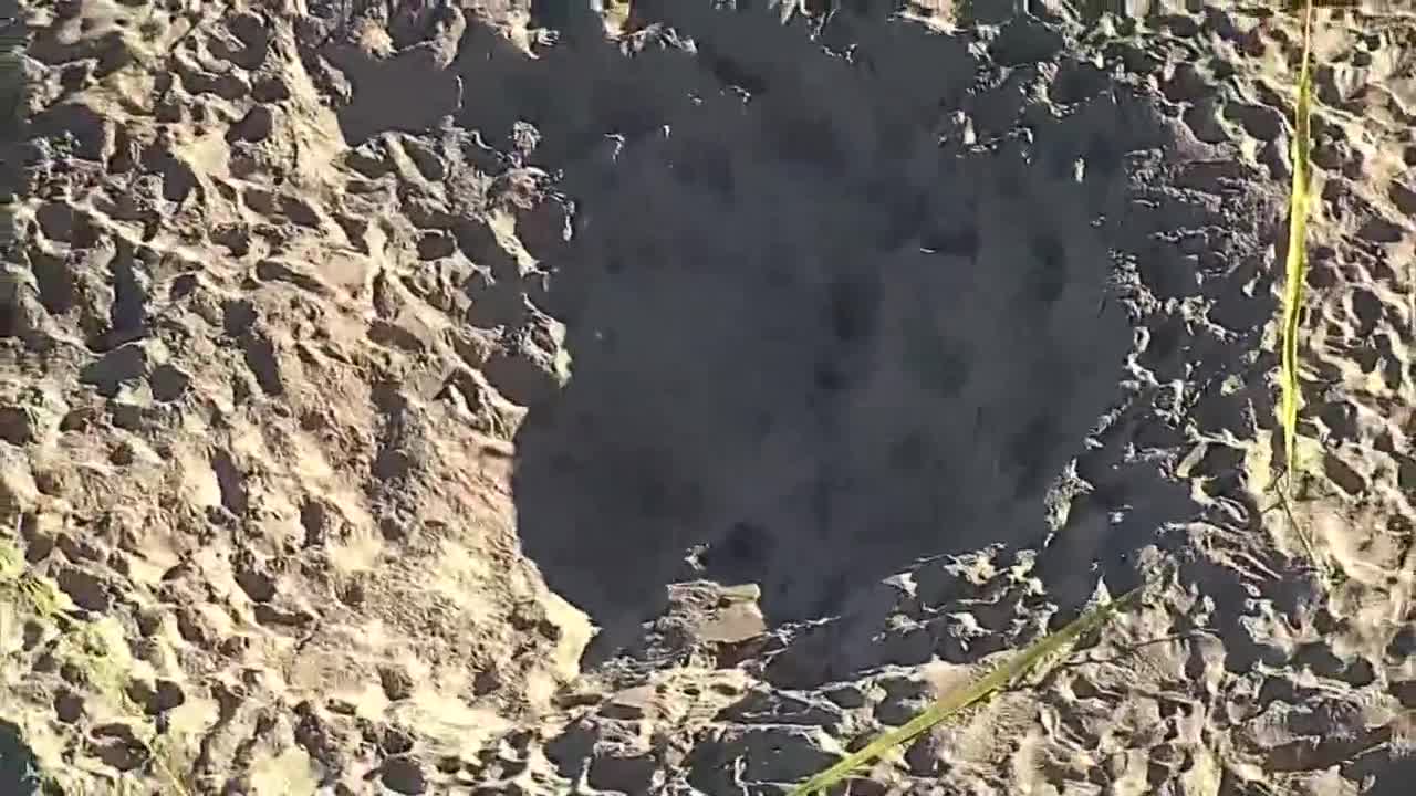 closeup of hole where Sloan Mattingly and Maddox Mattingly were trapped on beach in Lauderdale-by-the-Sea, Feb. 20, 2024