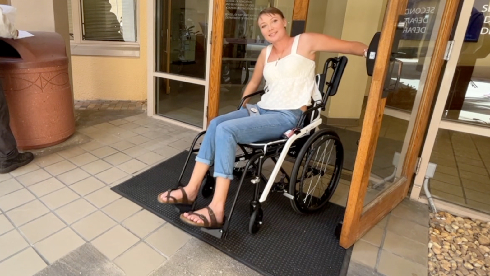 Palm Beach Atlantic University senior Savannah Carr demonstrates some of the accessibility issues she encounters while on the Palm Beach Atlantic University campus.