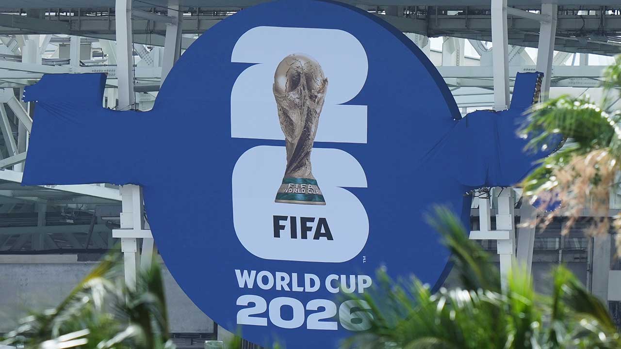 A sign promoting the 2026 FIFA World Cup hangs from Hard Rock Stadium, Wednesday, May 27, 2026, in Miami Gardens, Fla.