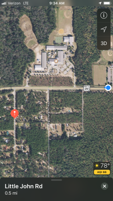 The person who is barricaded is somewhere near the red mark. The blue mark is where media is being held.