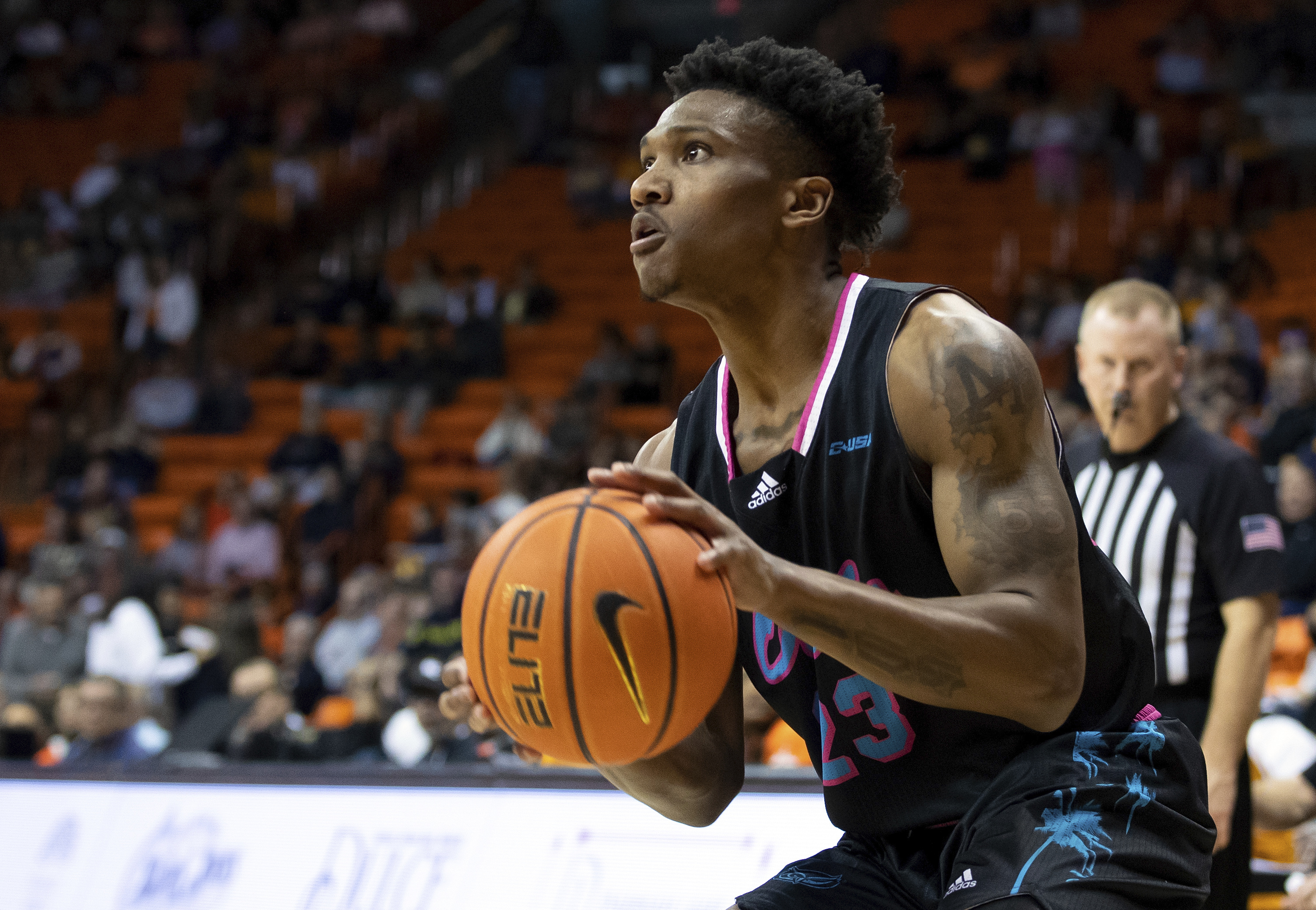 FAU Owls guard Brandon Weatherspoon aims for a 3-point shot at UTEP Miners, Jan. 21, 2023