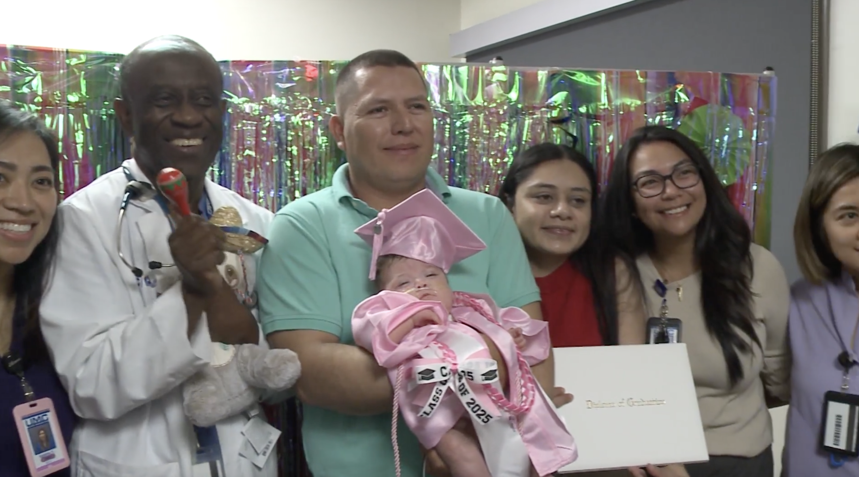 Baby Grecia, her family, and medical staff