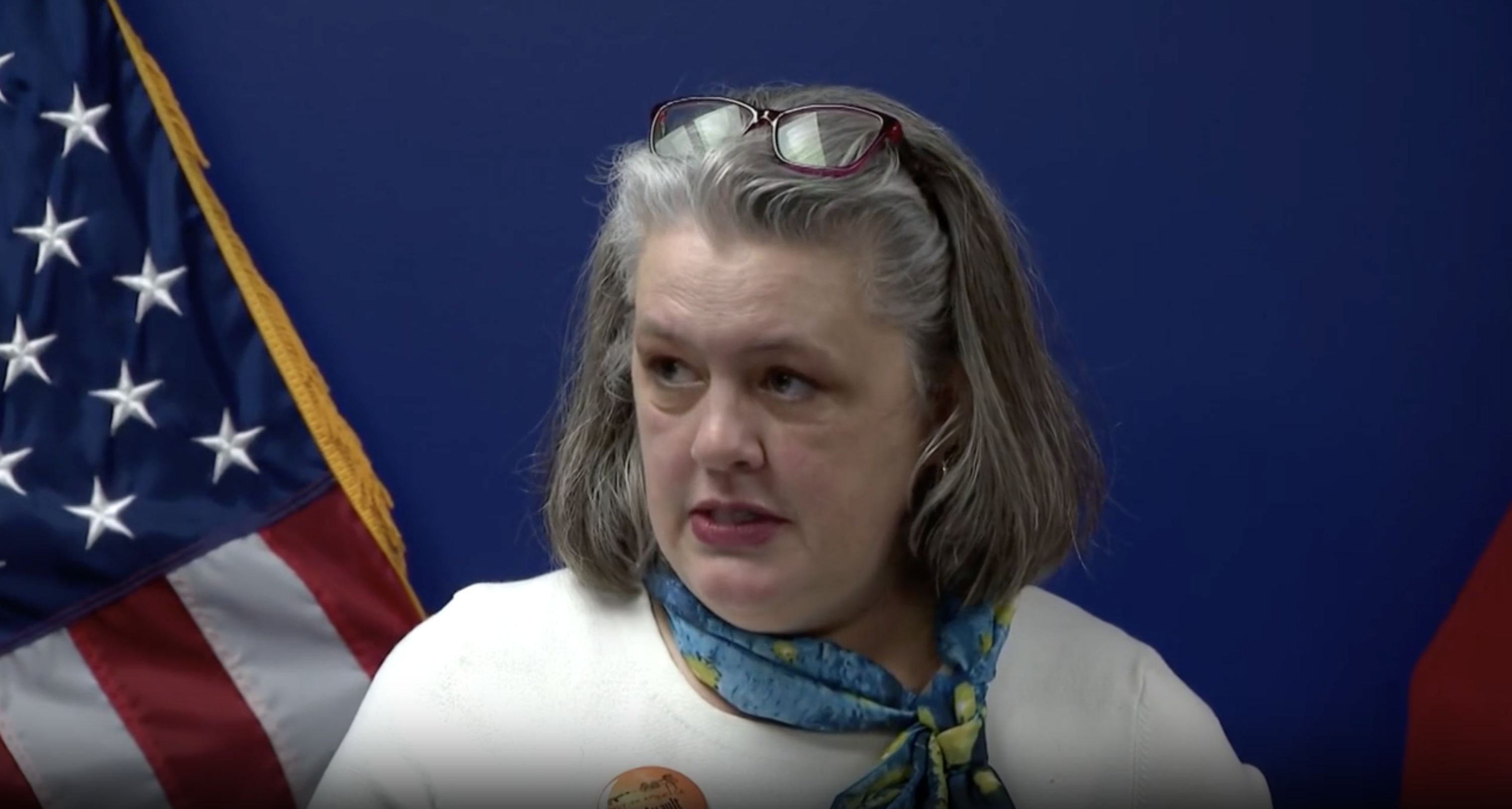 Anna Cottle speaking at presser