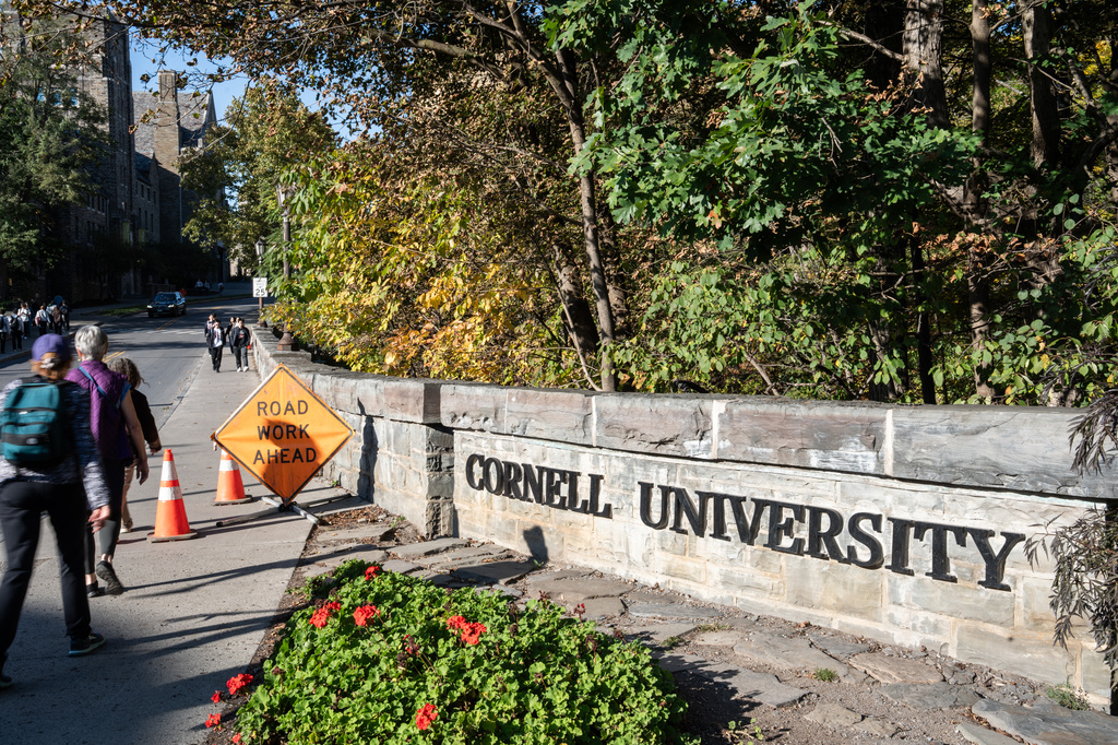 Students walk through Cornell University's campus, Wednesday, Oct. 7, 2026, in Ithaca, N.Y. 