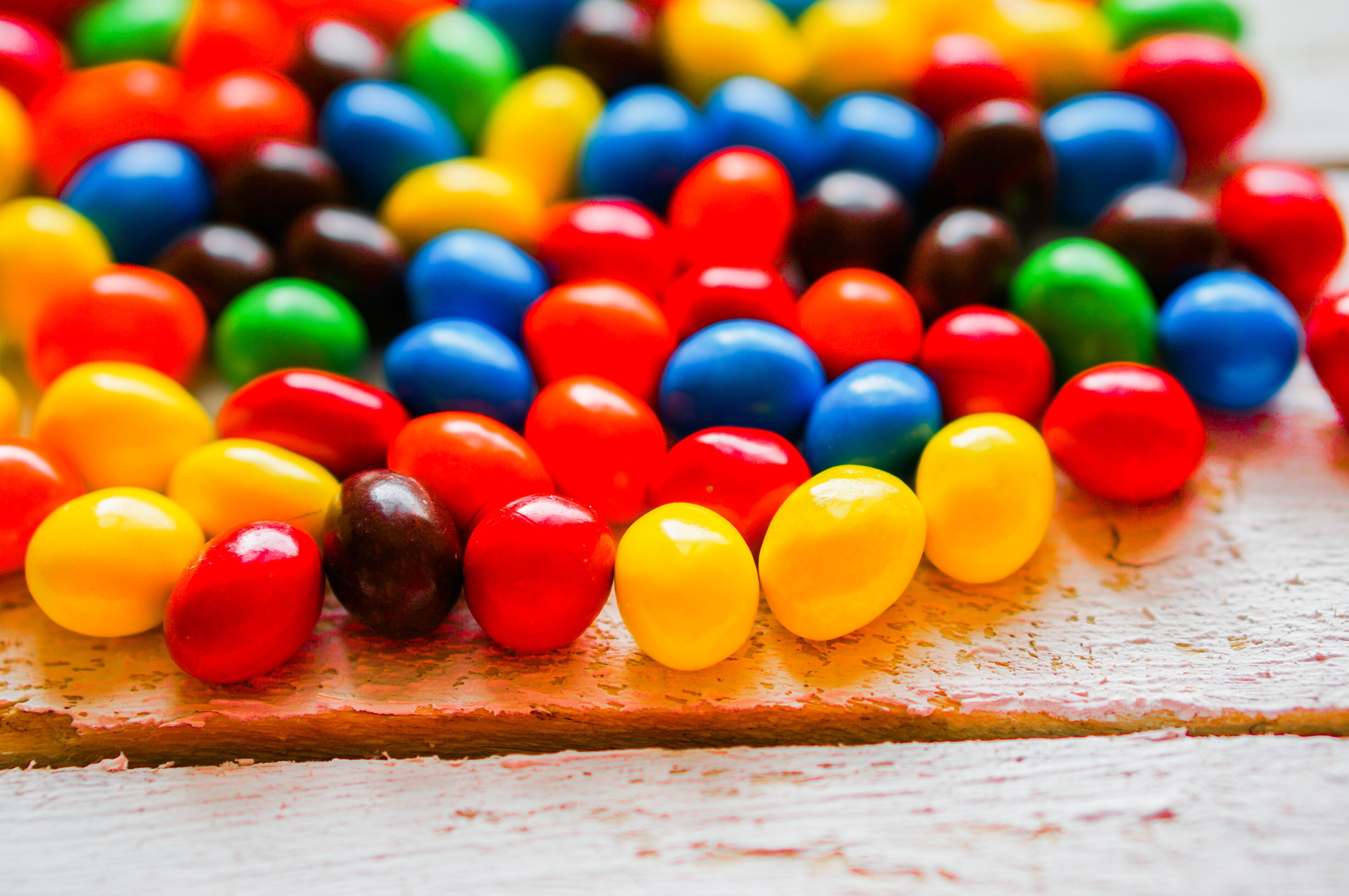 Colorful candies on wooden background candy 