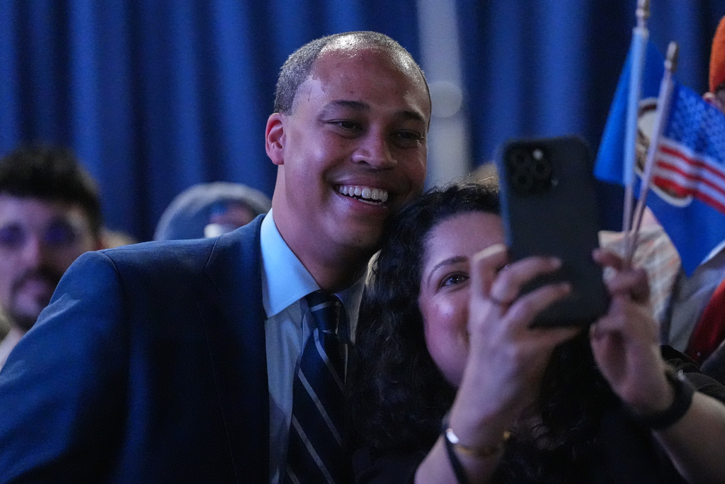Democrat Jay Jones takes a selfie with a supporter at an election night watch party for Democrat Abigail Spanberger after Jones was declared the winner of the Virginia attorney general's race Tuesday, Nov. 4, 2025, in Richmond, Va. 