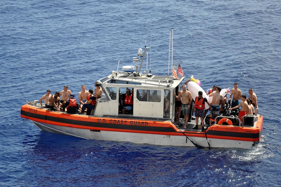 'Shark!'; Video shows Coast Guard react to shark swimming near crewmembers