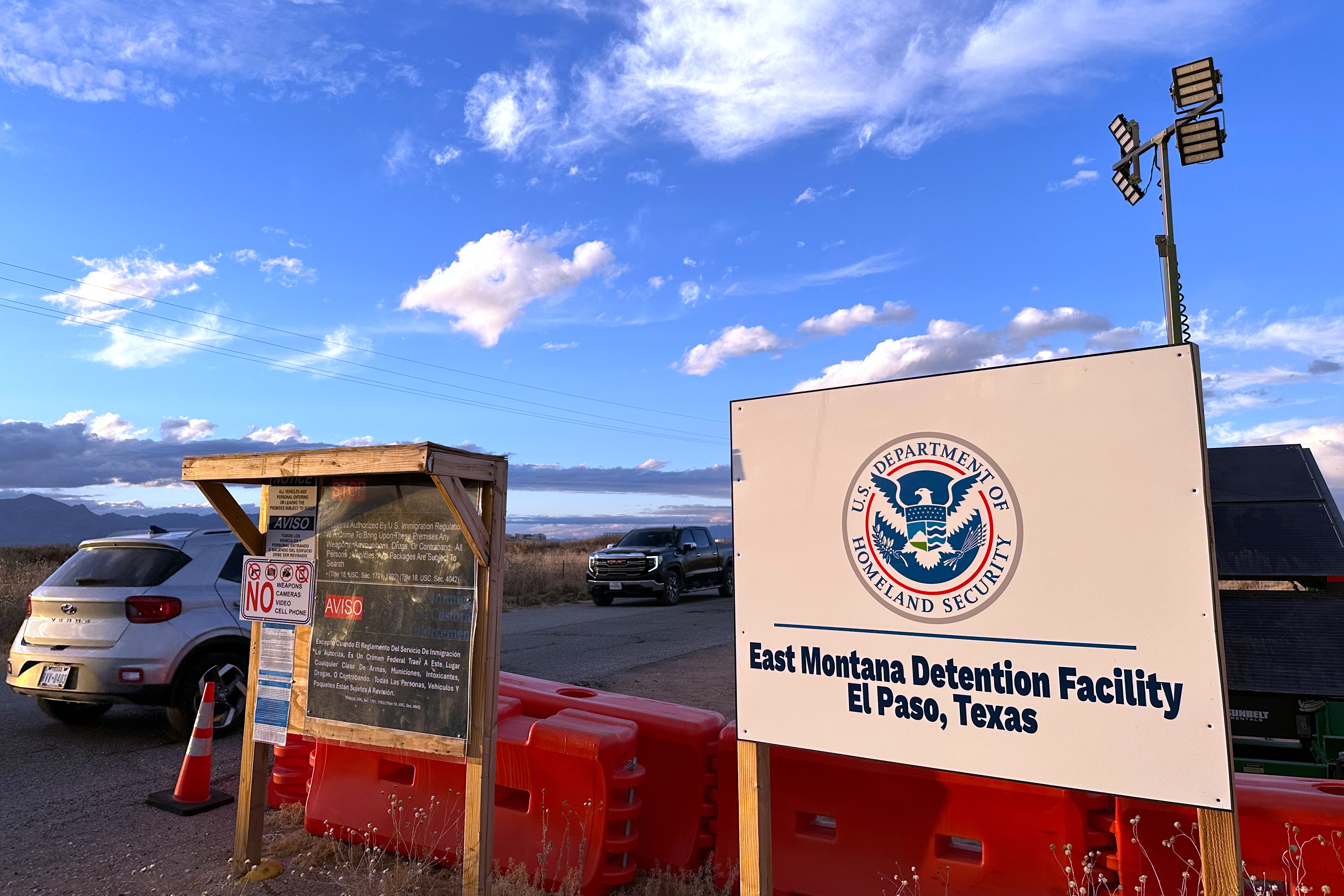 FILE - A sign marks the entrance to a series of hardened tents at the Camp East Montana immigrant detention center in the desert at a U.S. Army base on the outskirts of El Paso, Texas, Feb. 13, 2026.