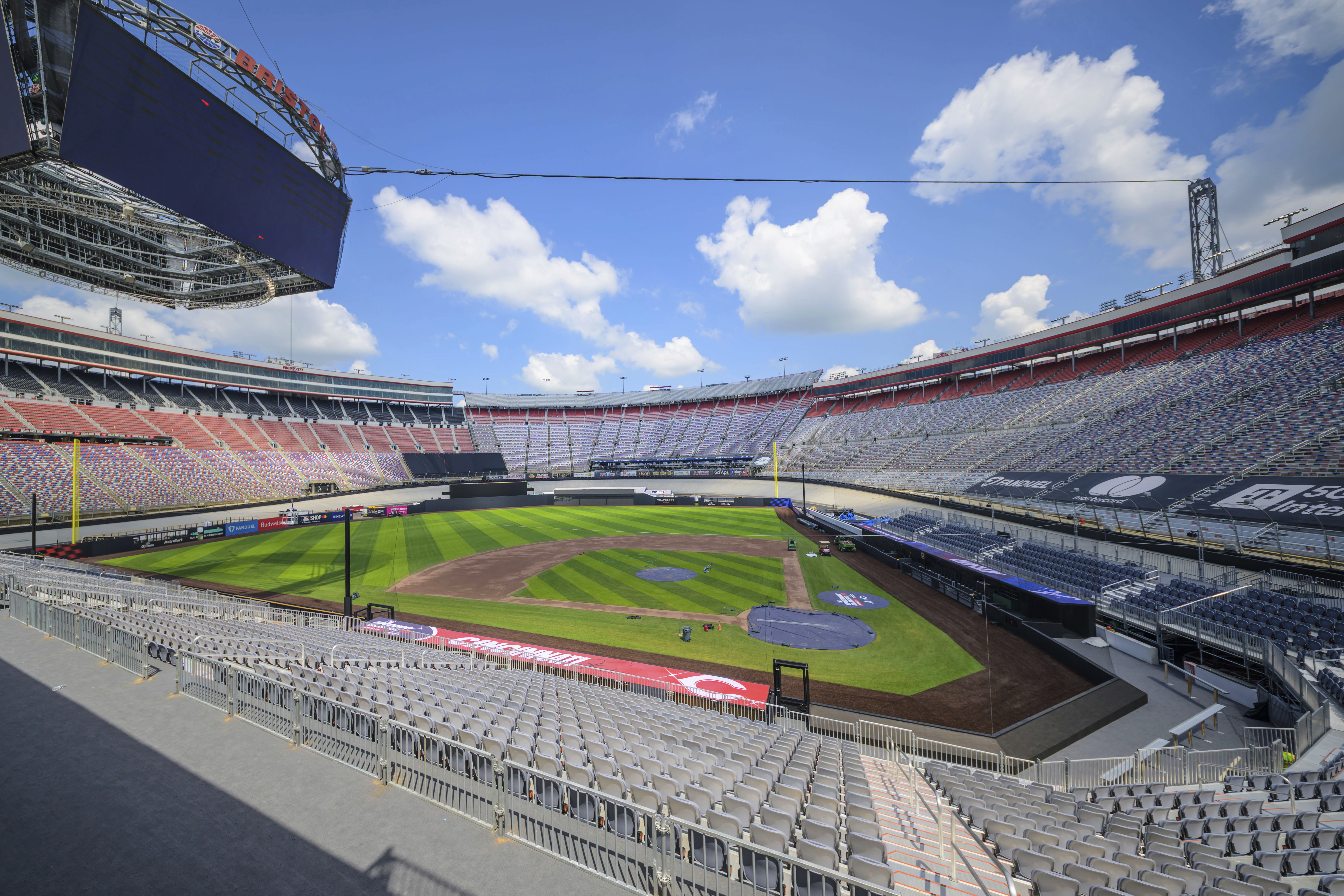 Work continues on the baseball field inside the racetrack at Bristol Motor Speedway, Friday, July 25, 2025, in Bristol, Tenn., for MLB Speedway Classic baseball game between the Cincinnati Reds and Atlanta Braves on Aug. 2. 