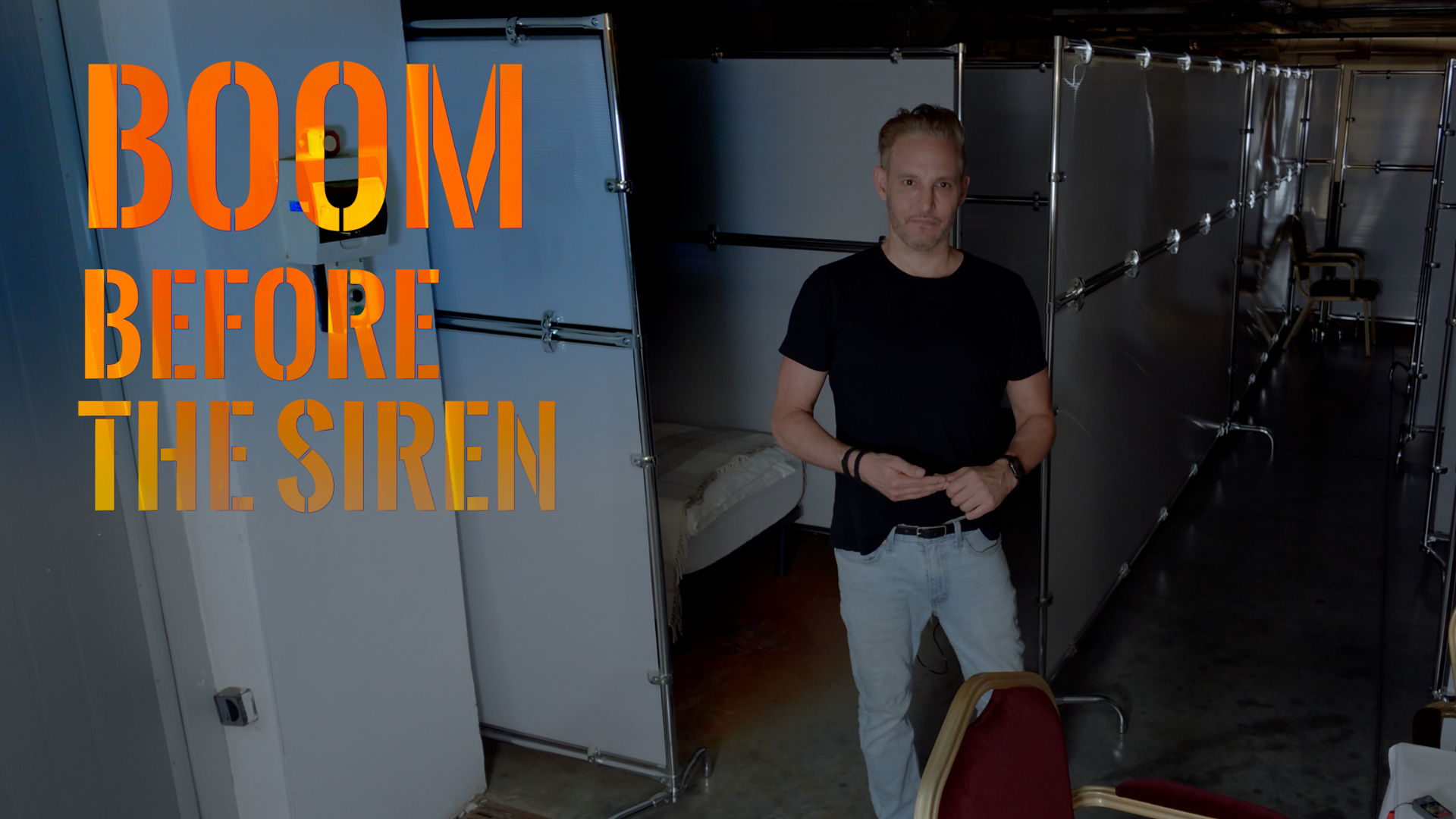 Scripps News International Correspondent Jason Bellini stands in a bomb shelter in Kyiv, Ukraine.