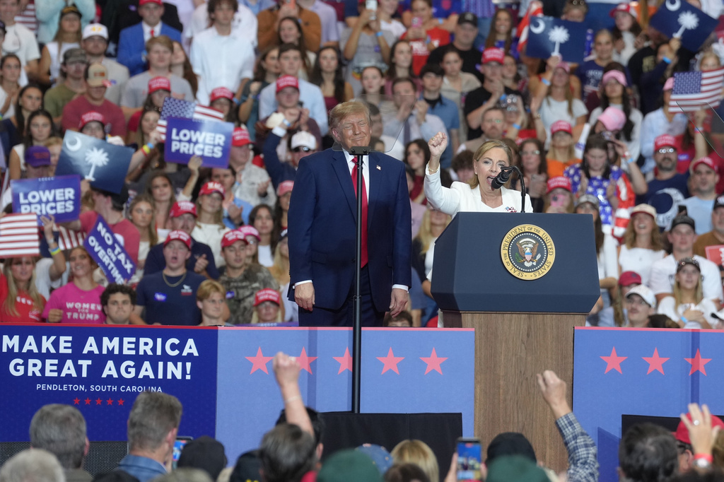 U.S. Sen. Darline Graham, R-S.C., right, speaks at a campaign rally as President Donald Trump watches Wednesday, Oct. 21, 2026, in Pendleton, S.C. 