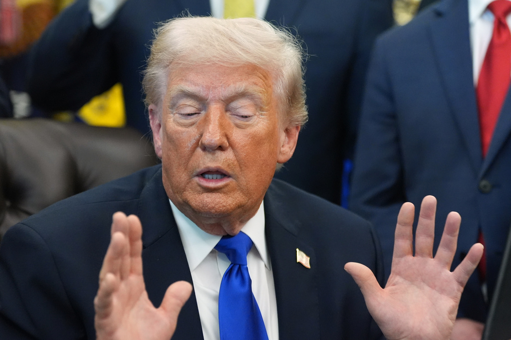 President Donald Trump speaks to reporters in the Oval Office of the White House, Thursday, April 30, 2026, in Washington. 