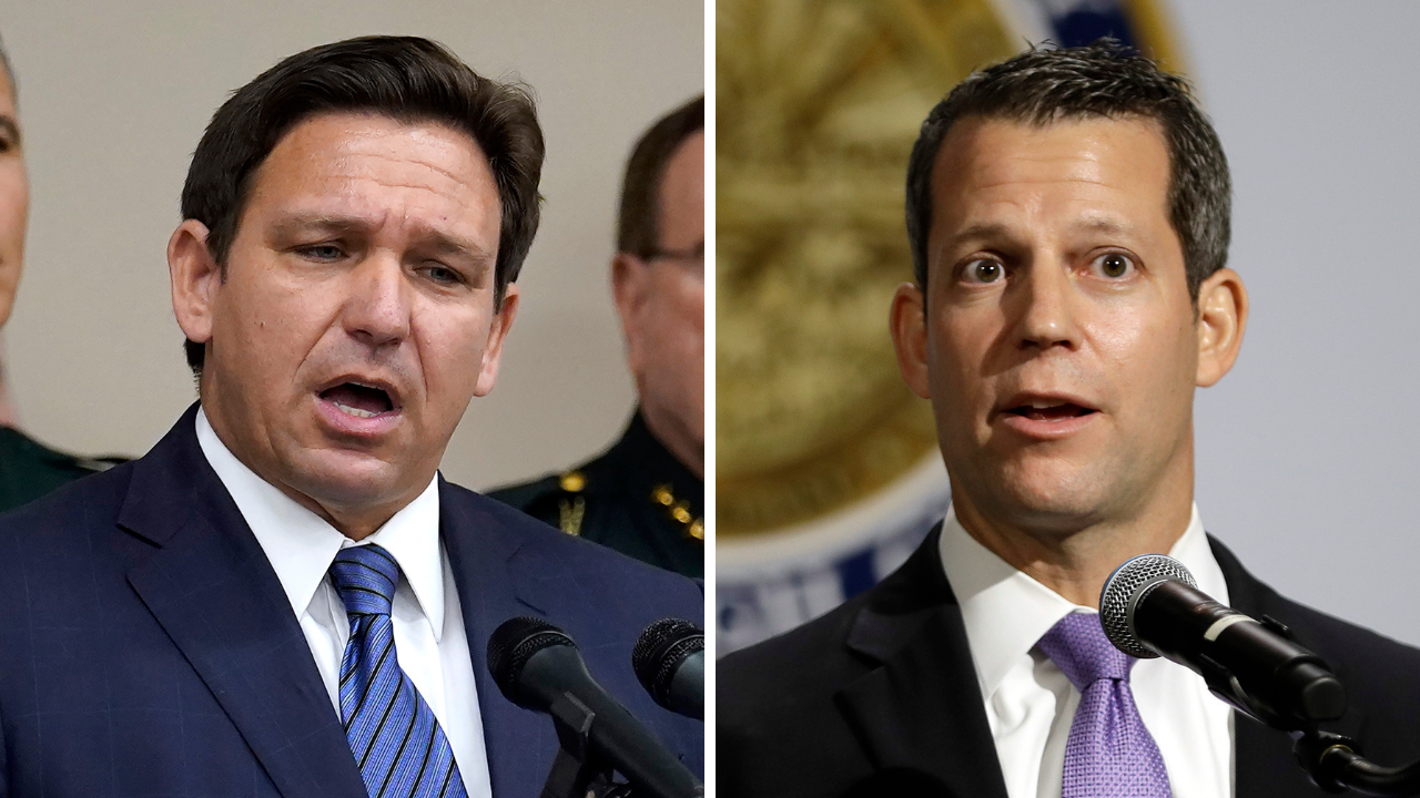 Gov. Ron DeSantis and Hillsborough County State Attorney Andrew Warren
