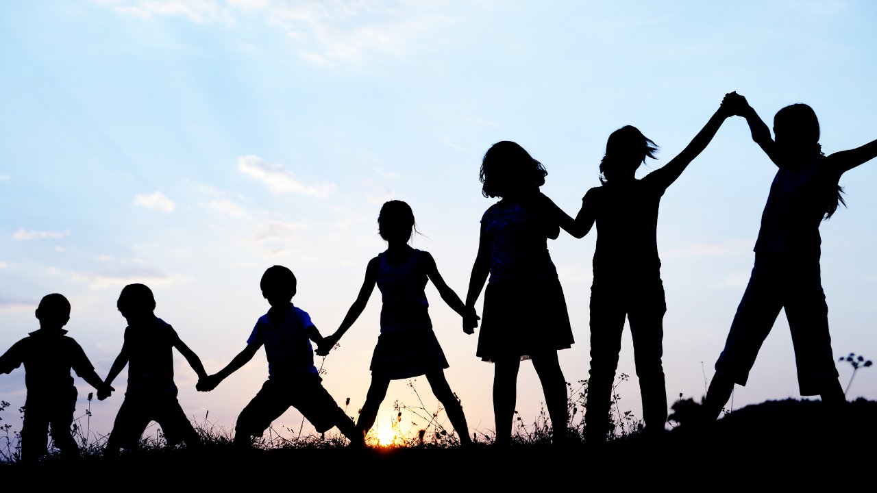 Children Standing in Line Holding Hands (FILE)